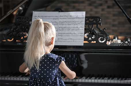 Child At Piano